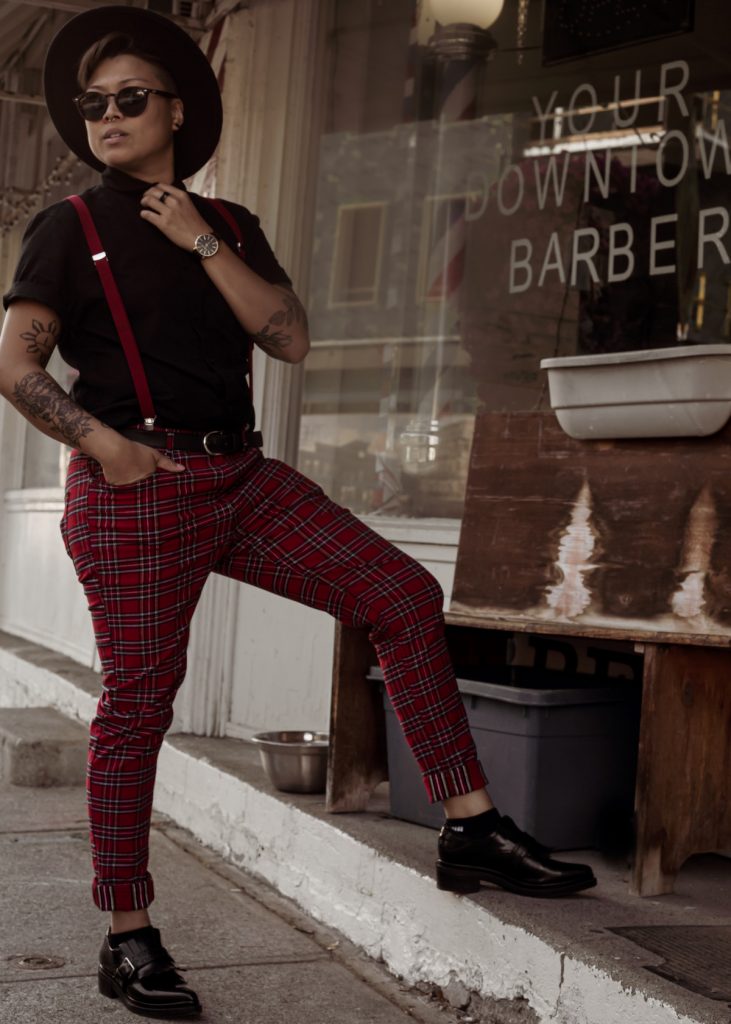 Girl outside barber shop