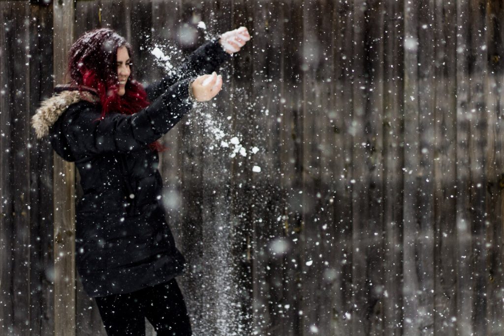 Girl playing in the snow