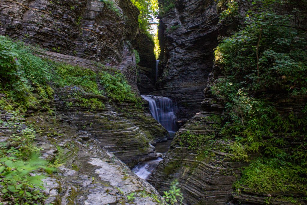 Waterfall surrounded by rocky ledges